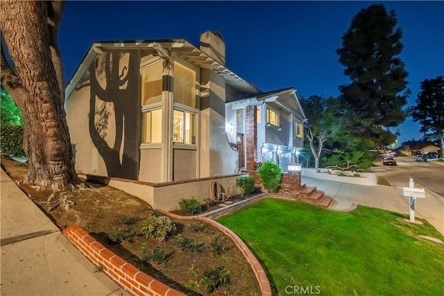 2239 Maystone Pl, Rowland Heights, CA 91748 - view of front of property featuring a lawn, a chimney, and stucco siding