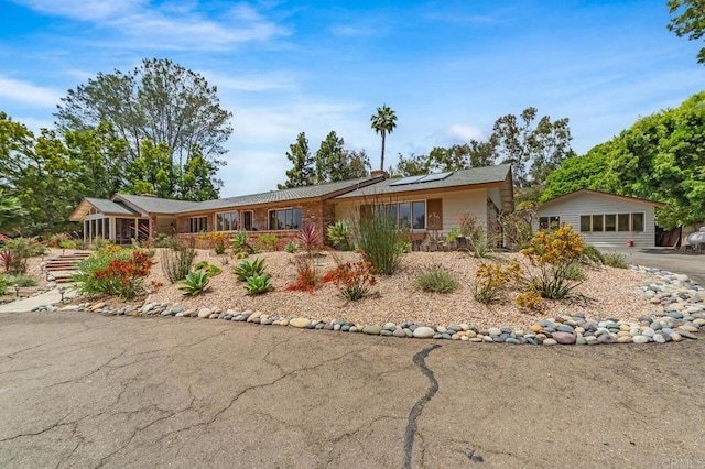 4678 Sun Vly, Del Mar, CA 92014 - ranch-style house with solar panels, a garage, and driveway