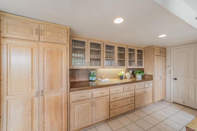 4678 Sun Vly, Del Mar, CA 92014 - kitchen featuring light brown cabinetry, glass insert cabinets, light tile patterned floors, and recessed lighting