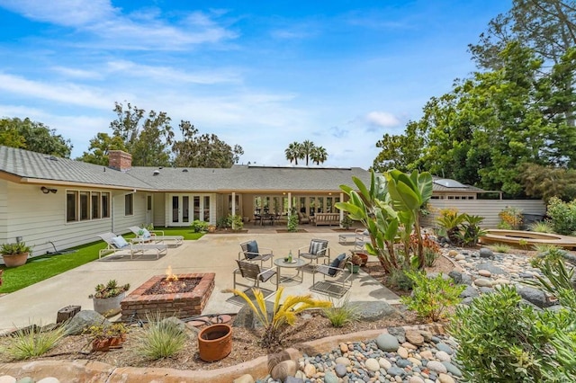 4678 Sun Vly, Del Mar, CA 92014 - back of property featuring a fire pit, french doors, a patio, and a chimney