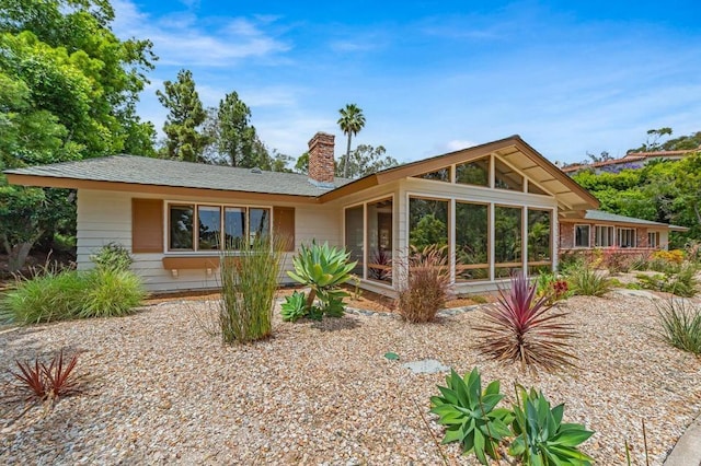 4678 Sun Vly, Del Mar, CA 92014 - back of property featuring a chimney and a sunroom