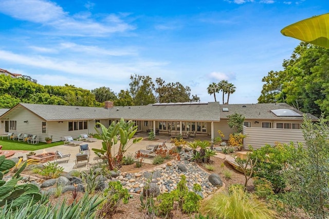 4678 Sun Vly, Del Mar, CA 92014 - rear view of property with a patio area, an outdoor fire pit, and a chimney