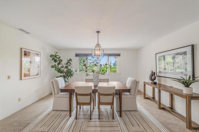4678 Sun Vly, Del Mar, CA 92014 - dining room with light colored carpet and a chandelier