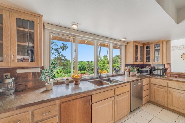 4678 Sun Vly, Del Mar, CA 92014 - kitchen featuring dishwasher, decorative backsplash, light brown cabinets, light tile patterned floors, and glass insert cabinets