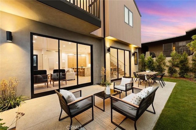 2206 Gates Ave Unit A, Redondo Beach, CA 90278 - patio terrace at dusk with a patio area, an outdoor hangout area, and a lawn