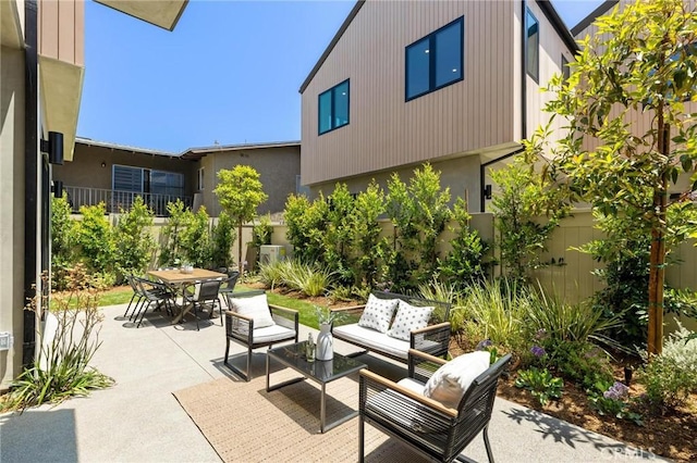 2206 Gates Ave Unit A, Redondo Beach, CA 90278 - fenced backyard featuring a patio area, outdoor lounge area, and outdoor dining area
