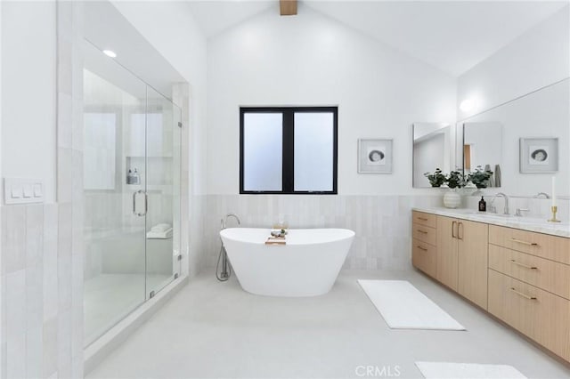2206 Gates Ave Unit A, Redondo Beach, CA 90278 - full bath featuring tile walls, a stall shower, vanity, a freestanding tub, and vaulted ceiling