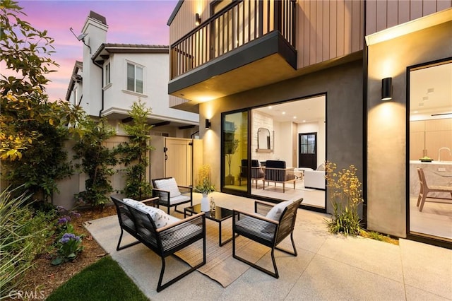 2206 Gates Ave Unit A, Redondo Beach, CA 90278 - patio terrace at dusk with a balcony, a patio area, and outdoor lounge area