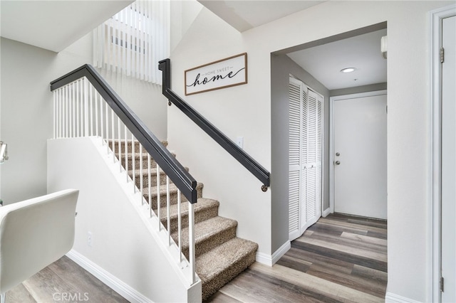 11718 Lucena Ave, Fontana, CA 92337 - stairs with wood finished floors and recessed lighting