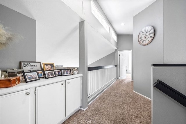 11718 Lucena Ave, Fontana, CA 92337 - hallway with carpet and an upstairs landing