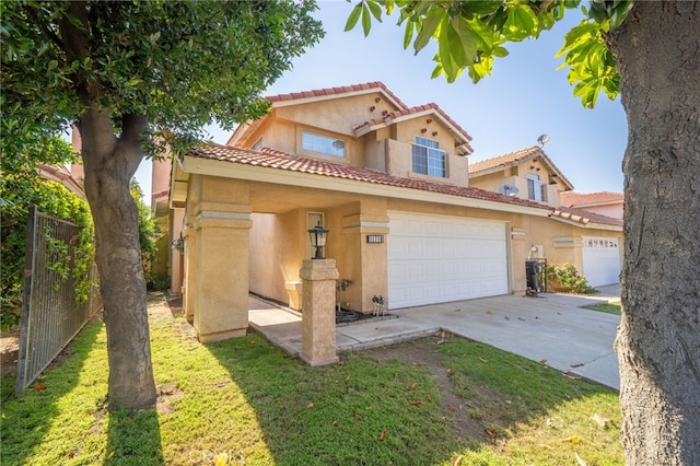 11718 Lucena Ave, Fontana, CA 92337 - view of front of house featuring concrete driveway, a tiled roof, stucco siding, and an attached garage