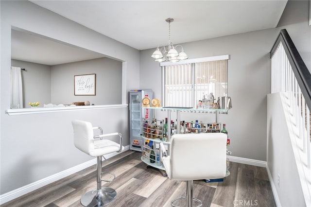 11718 Lucena Ave, Fontana, CA 92337 - bathroom featuring wood finished floors and a chandelier
