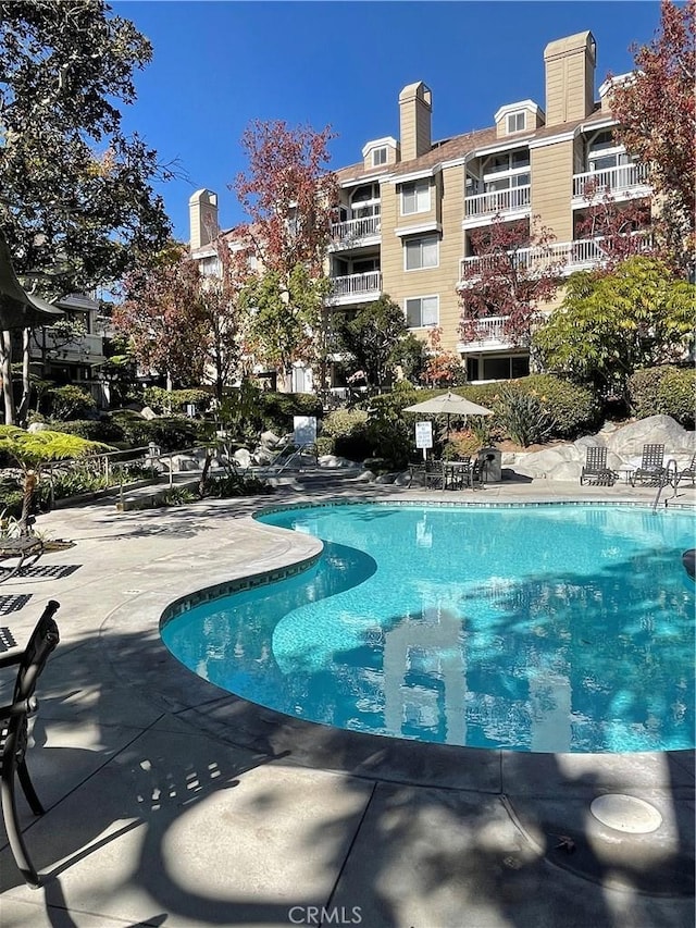 20301 Bluffside Cir Unit D406, Huntington Beach, CA 92646 - community pool featuring a patio