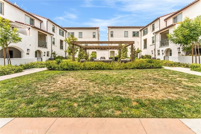 1446 Azalea Cir, Gardena, CA 90247 - surrounding community featuring a residential view, a lawn, and a pergola