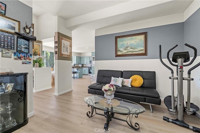 29508 Alyssum Ln, Canyon Country, CA 91387 - living area featuring light wood-style flooring and baseboards