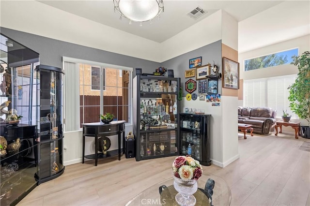 29508 Alyssum Ln, Canyon Country, CA 91387 - living room featuring wood finished floors and a dry bar