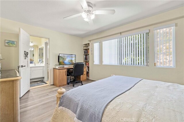 29508 Alyssum Ln, Canyon Country, CA 91387 - bedroom with light wood-type flooring, multiple windows, a ceiling fan, and connected bathroom