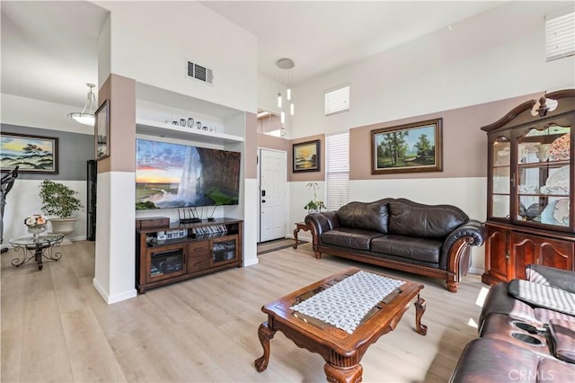 29508 Alyssum Ln, Canyon Country, CA 91387 - living area with wood finished floors and a towering ceiling