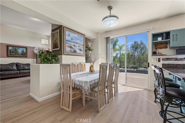 29508 Alyssum Ln, Canyon Country, CA 91387 - dining area with light wood-style floors and baseboards