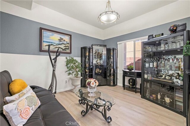 29508 Alyssum Ln, Canyon Country, CA 91387 - living room featuring wood finished floors and a dry bar