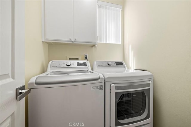 29508 Alyssum Ln, Canyon Country, CA 91387 - laundry area with washing machine and dryer and cabinet space