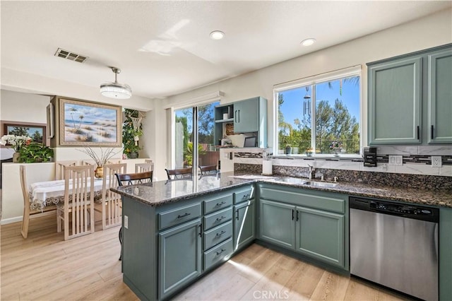 29508 Alyssum Ln, Canyon Country, CA 91387 - kitchen featuring stainless steel dishwasher, a peninsula, light wood finished floors, dark stone counters, and recessed lighting