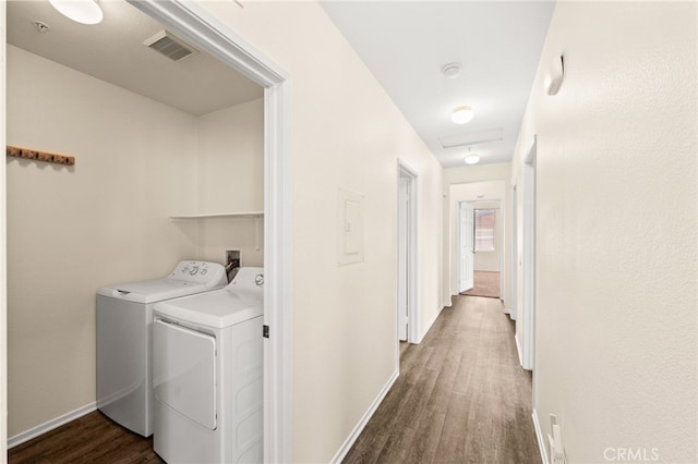 39719 Princeton Way Unit C, Murrieta, CA 92563 - laundry room featuring dark wood-style flooring and separate washer and dryer