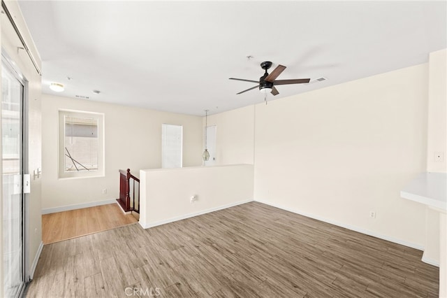 39719 Princeton Way Unit C, Murrieta, CA 92563 - unfurnished room featuring wood finished floors and ceiling fan