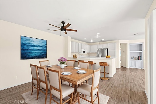 39719 Princeton Way Unit C, Murrieta, CA 92563 - dining area featuring light wood-style floors, recessed lighting, and ceiling fan