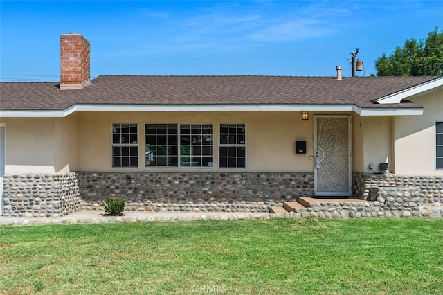 1329 S St Malo St, West Covina, CA 91790 - entrance to property with stucco siding, a yard, and a shingled roof