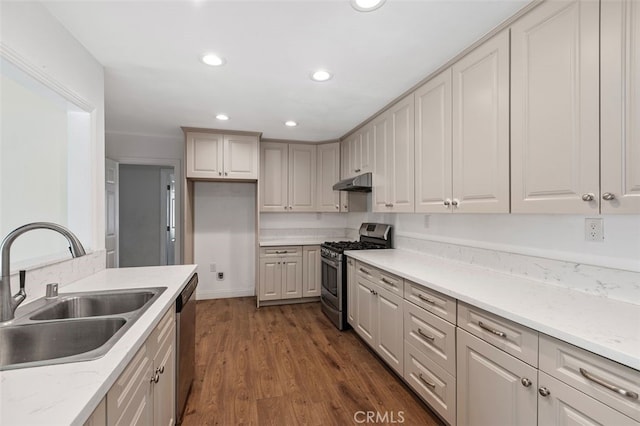 1329 S St Malo St, West Covina, CA 91790 - kitchen featuring stainless steel appliances, under cabinet range hood, dark wood-type flooring, recessed lighting, and light stone countertops