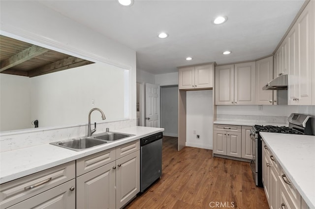 1329 S St Malo St, West Covina, CA 91790 - kitchen with appliances with stainless steel finishes, under cabinet range hood, recessed lighting, and dark wood-style flooring