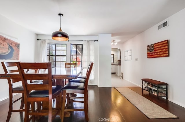1313 Valley View Rd Unit 103, Glendale, CA 91202 - dining space featuring wood finished floors and arched walkways
