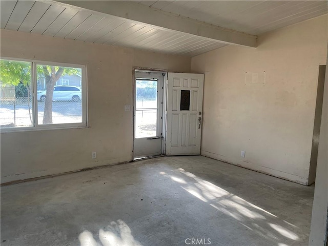 2441 Madrone St, Sutter, CA 95982 - entrance foyer featuring healthy amount of natural light, unfinished concrete floors, and a wooden ceiling with exposed beams