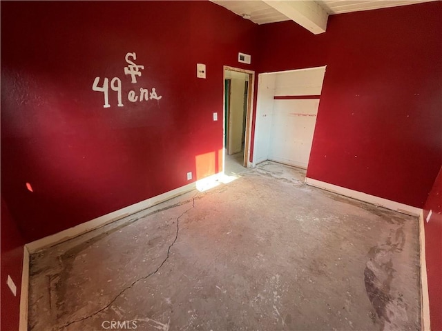 2441 Madrone St, Sutter, CA 95982 - empty room with concrete floors and beamed ceiling