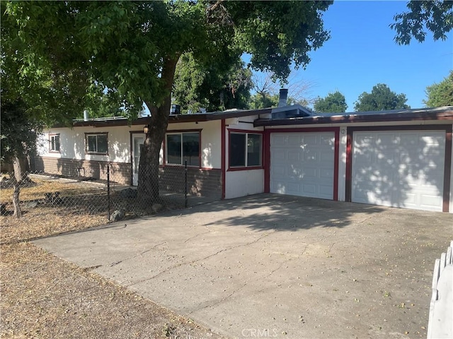 2441 Madrone St, Sutter, CA 95982 - single story home featuring concrete driveway, a garage, brick siding, and stucco siding