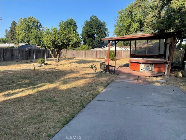 2441 Madrone St, Sutter, CA 95982 - fenced backyard featuring a hot tub, a patio, and a deck
