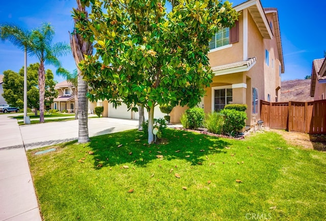 8550 Rolling Hills Dr, Corona, CA 92883 - view of front of home with driveway and stucco siding