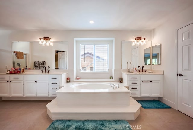 8550 Rolling Hills Dr, Corona, CA 92883 - full bathroom with a garden tub, two vanities, a chandelier, and recessed lighting