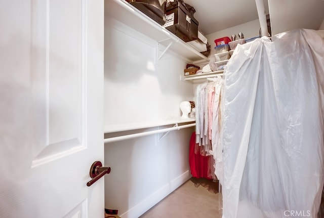 8550 Rolling Hills Dr, Corona, CA 92883 - spacious closet with light tile patterned floors
