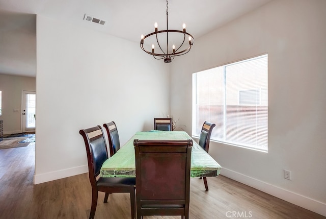 8550 Rolling Hills Dr, Corona, CA 92883 - dining room with a chandelier and wood finished floors