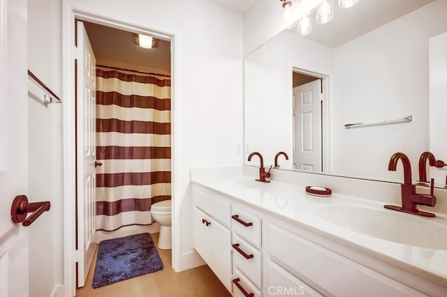 8550 Rolling Hills Dr, Corona, CA 92883 - bathroom featuring double vanity, tile patterned floors, and a shower with shower curtain