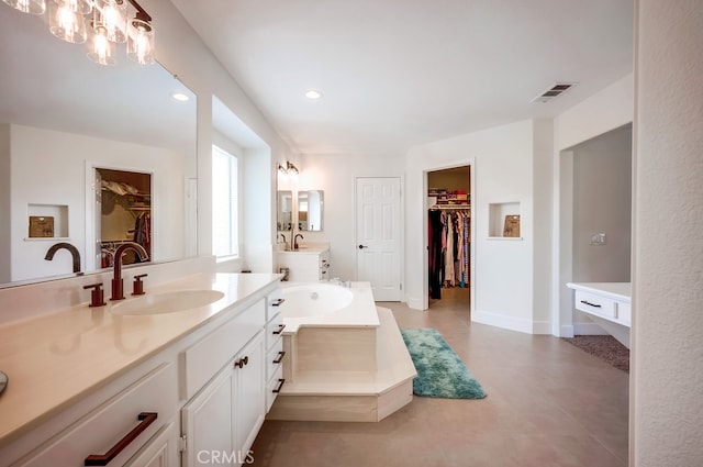 8550 Rolling Hills Dr, Corona, CA 92883 - full bathroom featuring a spacious closet, two vanities, recessed lighting, a bath, and a chandelier