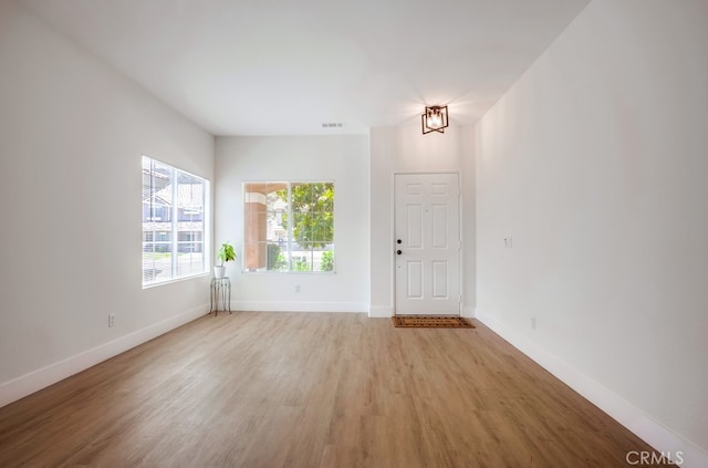 8550 Rolling Hills Dr, Corona, CA 92883 - entryway featuring light wood-style flooring and baseboards