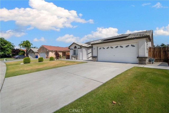 5224 Sierra Caves Ave, Bakersfield, CA 93313 - ranch-style house featuring stone siding, concrete driveway, stucco siding, and roof mounted solar panels