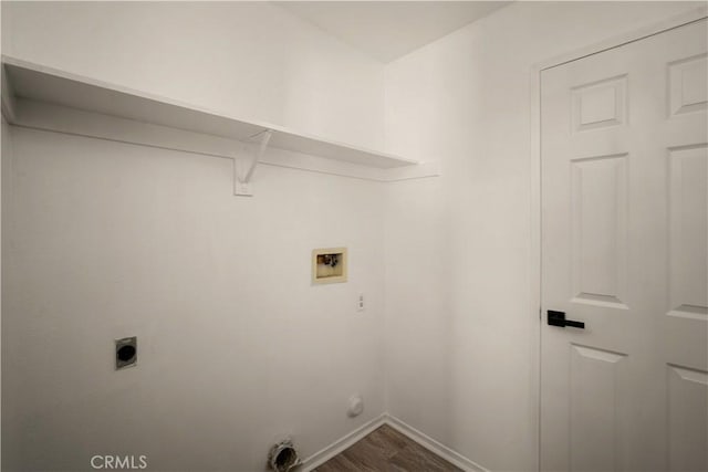 5224 Sierra Caves Ave, Bakersfield, CA 93313 - washroom with hookup for a washing machine, electric dryer hookup, and dark wood-style floors