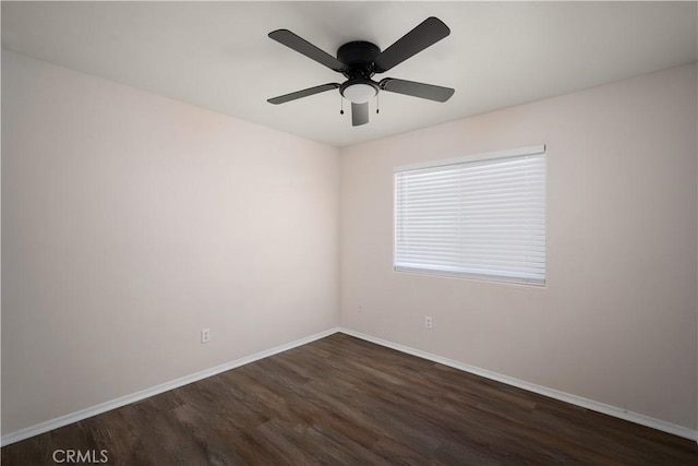 5224 Sierra Caves Ave, Bakersfield, CA 93313 - unfurnished room featuring dark wood-type flooring and a ceiling fan