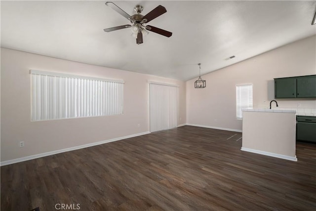 5224 Sierra Caves Ave, Bakersfield, CA 93313 - unfurnished living room featuring lofted ceiling, ceiling fan, and dark wood-style floors