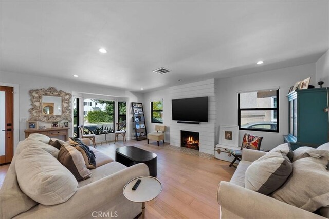 1834 Stearns Dr, Los Angeles, CA 90035 - living area with recessed lighting, a fireplace, and light wood-style floors