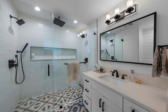 1834 Stearns Dr, Los Angeles, CA 90035 - full bath with vanity, a stall shower, and recessed lighting